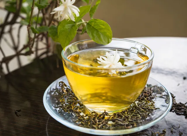 Organic Green Tea with Jasmine Flower and Jasmine Tea with Dried Leaves on tea cup