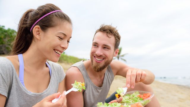 Happy,Young,People,Eating,Healthy,Salad,For,Lunch.,Multiracial,Group