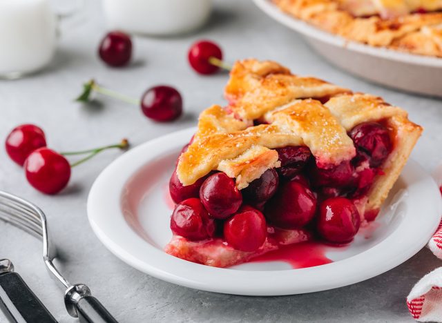 Homemade Cherry Pie with a Flaky Crust on Grey stone background.