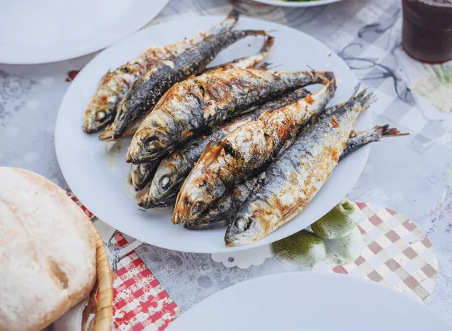 Grilled sardines on a plate, All Saints, 'Santos Populares' holidays in Lisbon in June