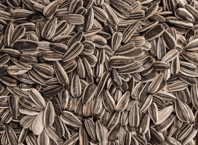 Gray sunflower seeds. Top view. Background, texture