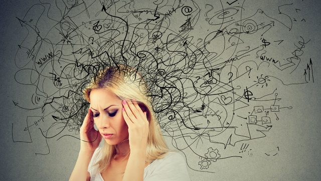 Thoughtful blonde woman with a mess in her head