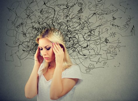 Thoughtful blonde woman with a mess in her head