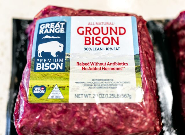 Naples, USA - April 29, 2022: Macro closeup of fresh red raw uncooked packaged ground bison meat from Great Range brand company grass-fed raised without antibiotics and no added hormones