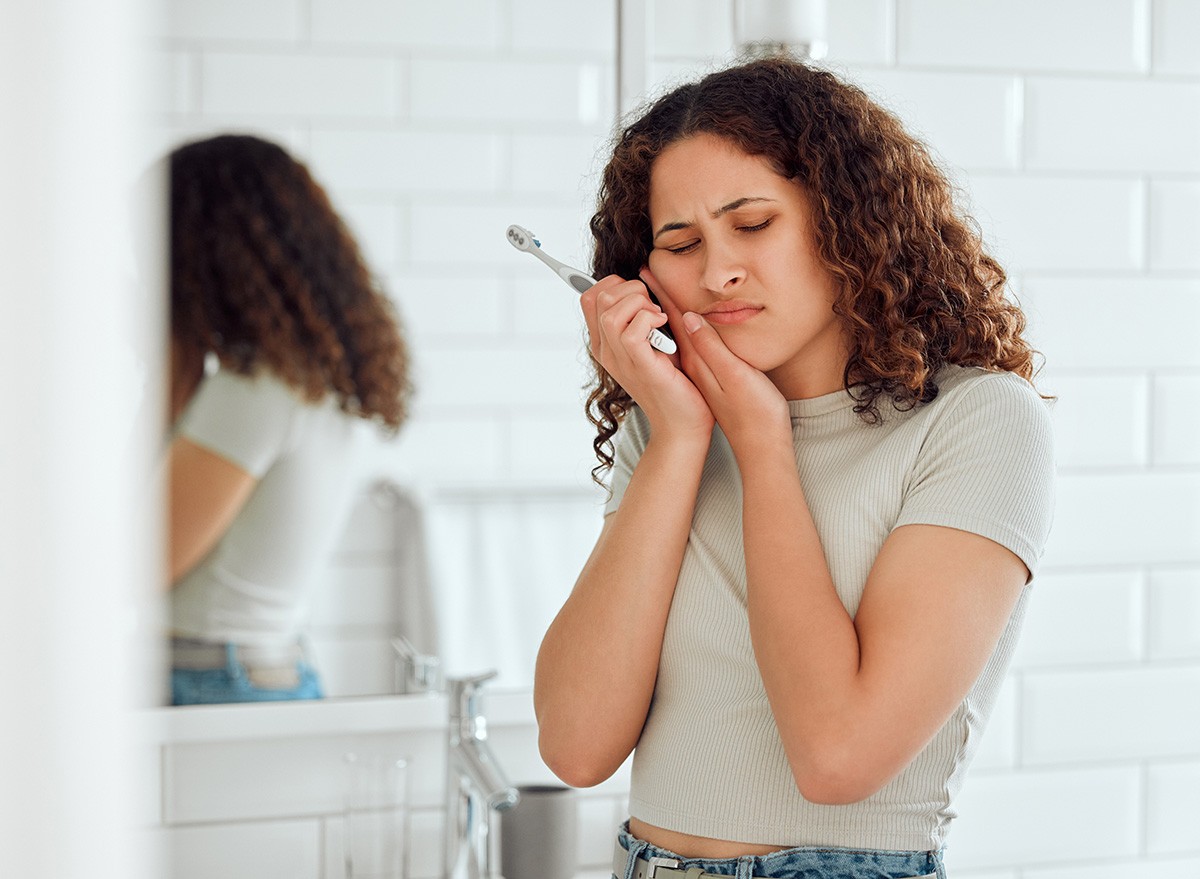 Toothache,,Pain,And,Sensitive,Teeth,With,A,Woman,Brushing,dental,dentist,tooth teeth