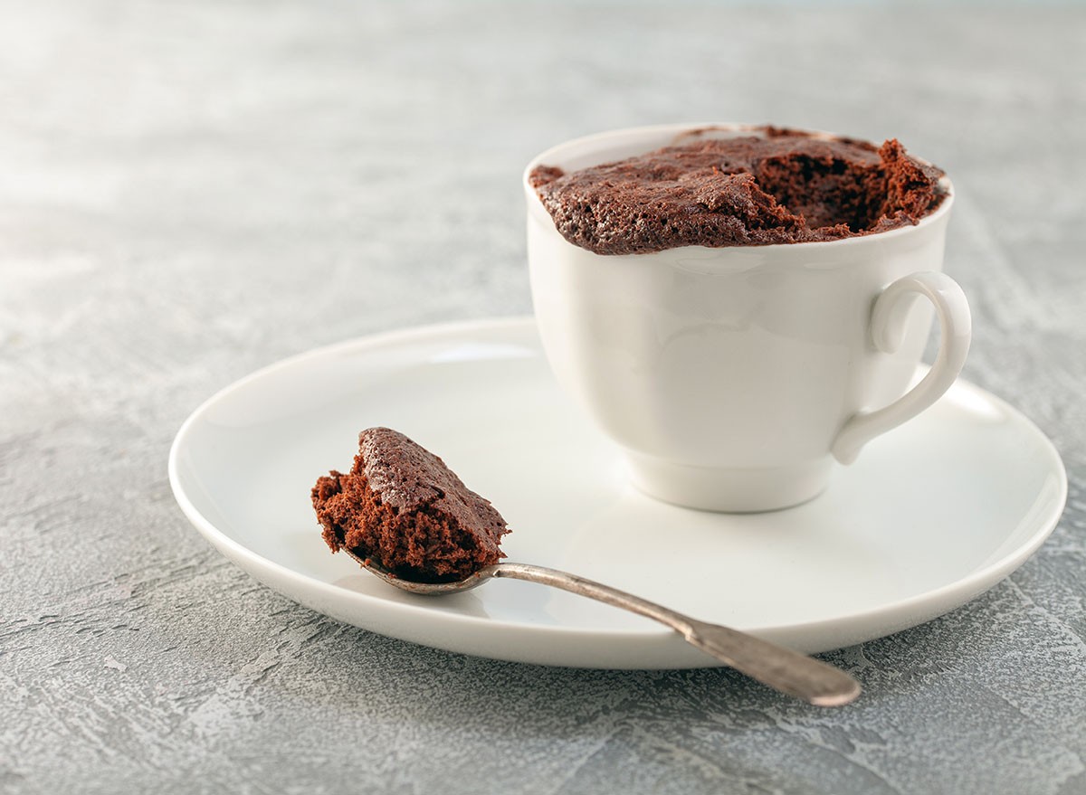 Chocolate cupcake in a white mug. Easy homemade dessert. Mugcake