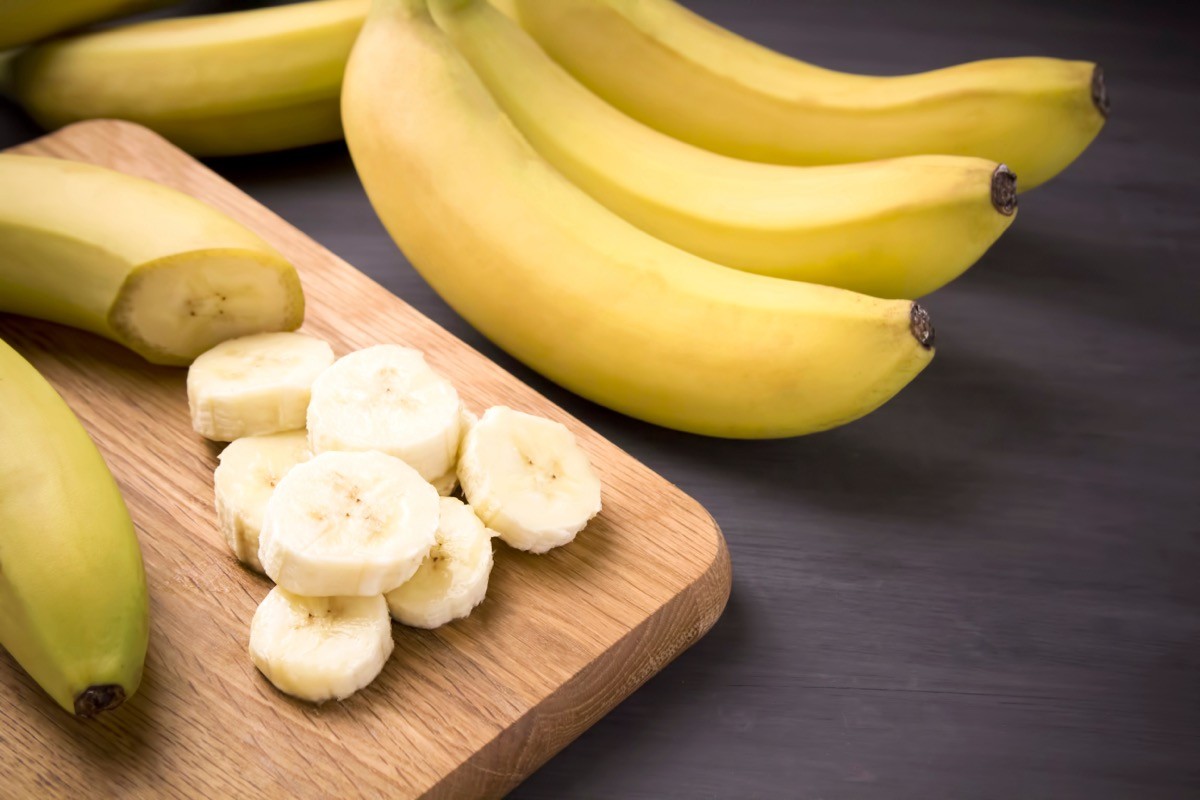 A,Bunch,Of,Bananas,And,A,Sliced,Banana,On,A