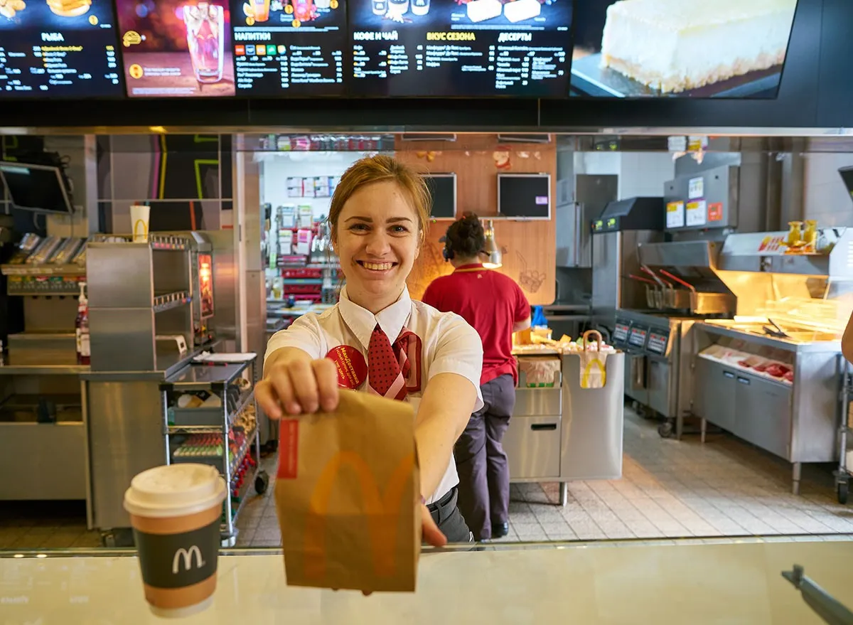 worker at McDonald's. McDonald's is an American hamburger and fast food restaurant chain.