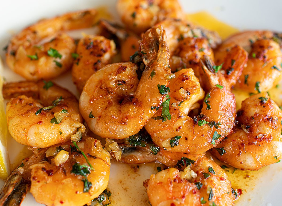 Pan fried butter garlic shrimp on plate