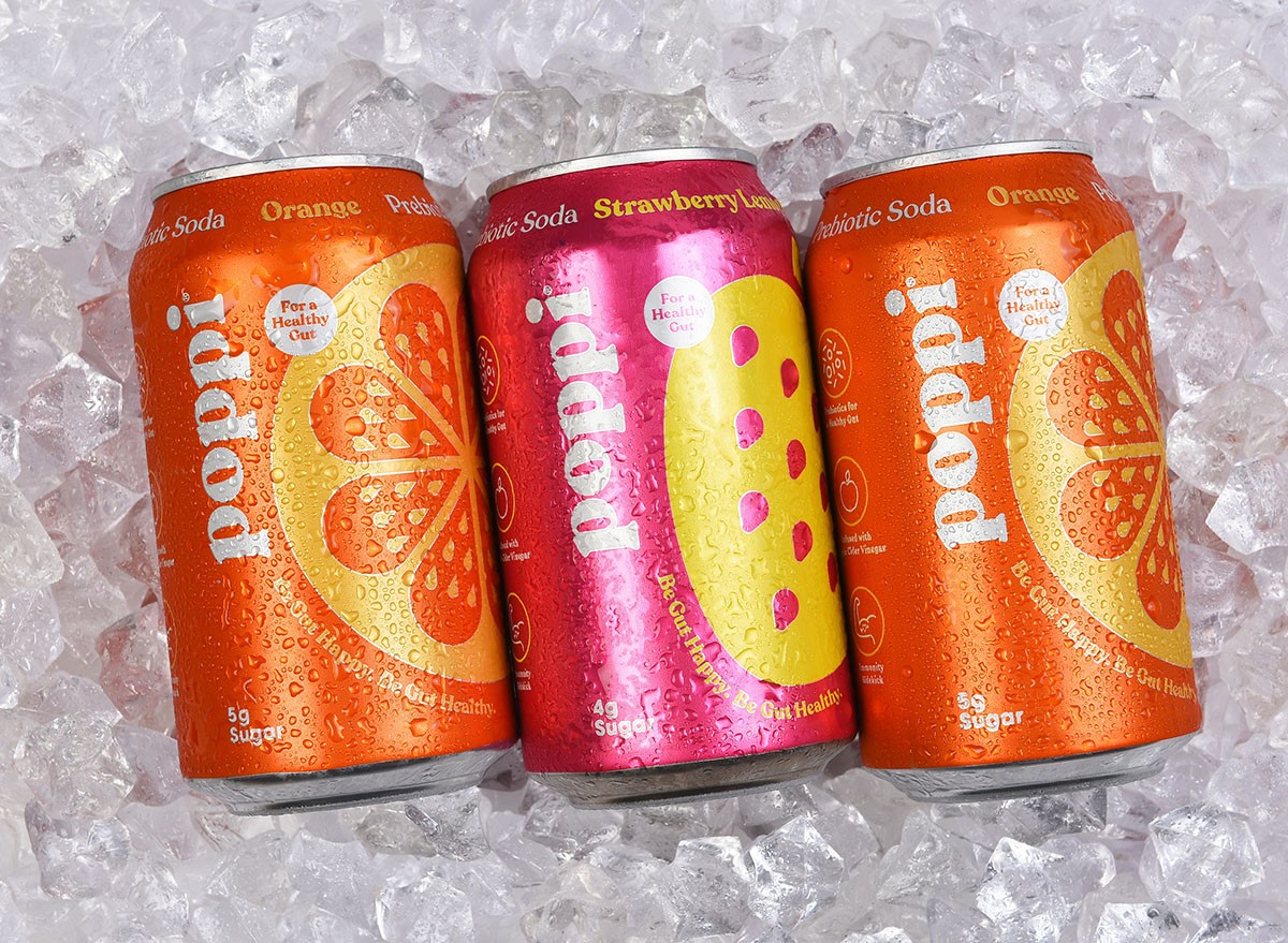 IRVINE, CALIFORNIA - 6 SEPT 2024: Three cans of Poppi Prebiotic Soda on a bed of ice.