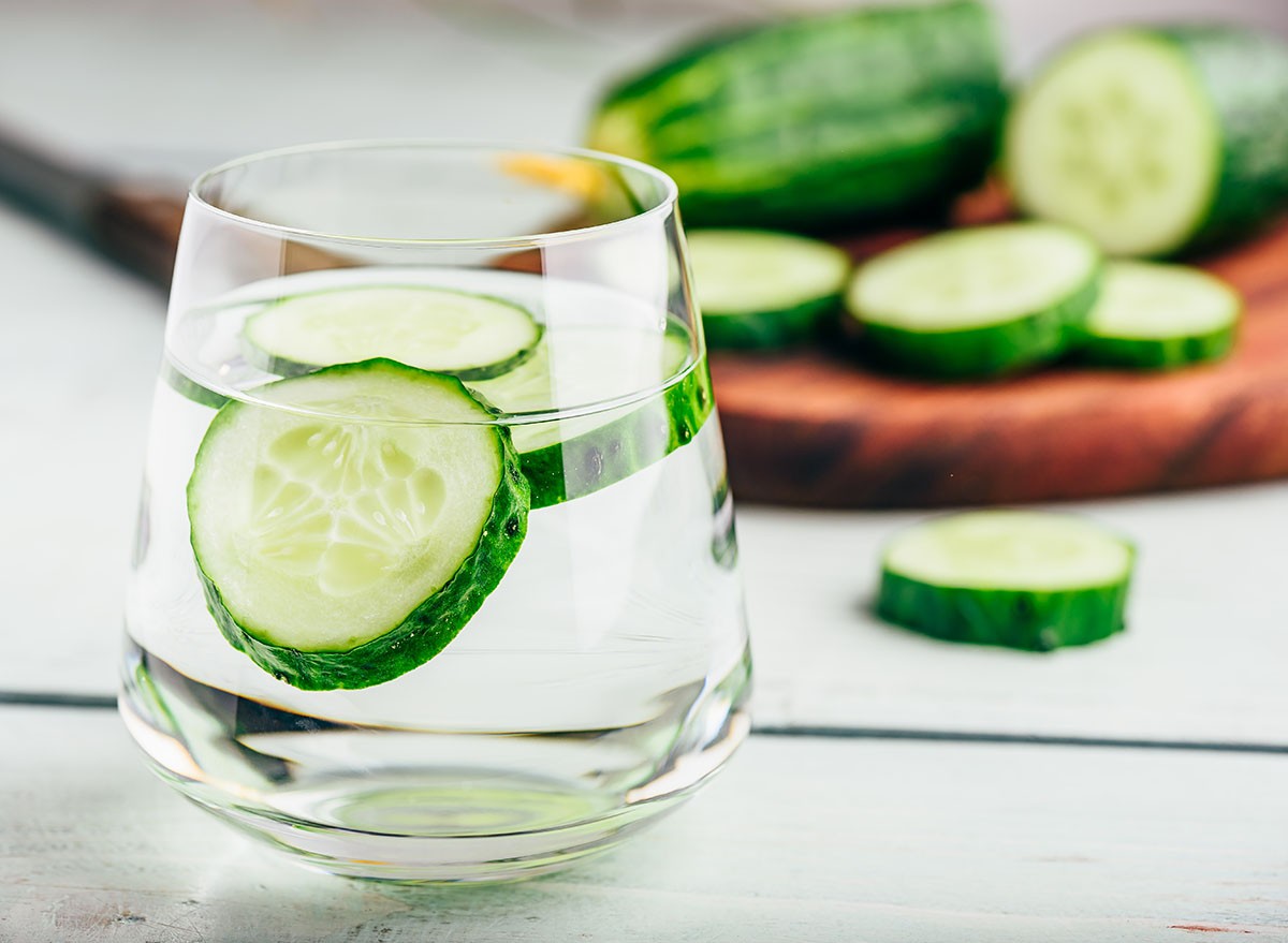 Detox water with sliced cucumber in a drinking glass