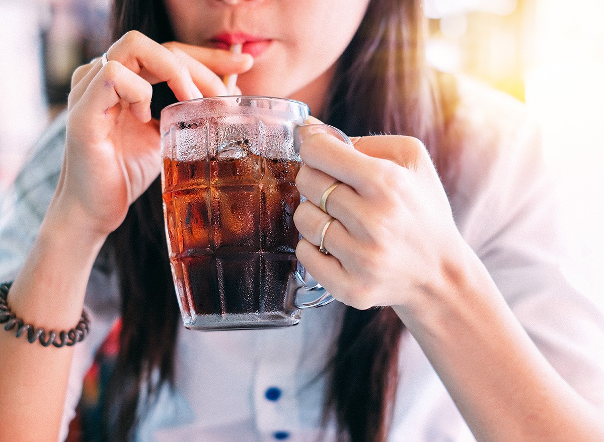 ,Woman,Drinking,Ice,Cola,In,The,Glass.food,And,Beverage,soft drink,coke,pepsi