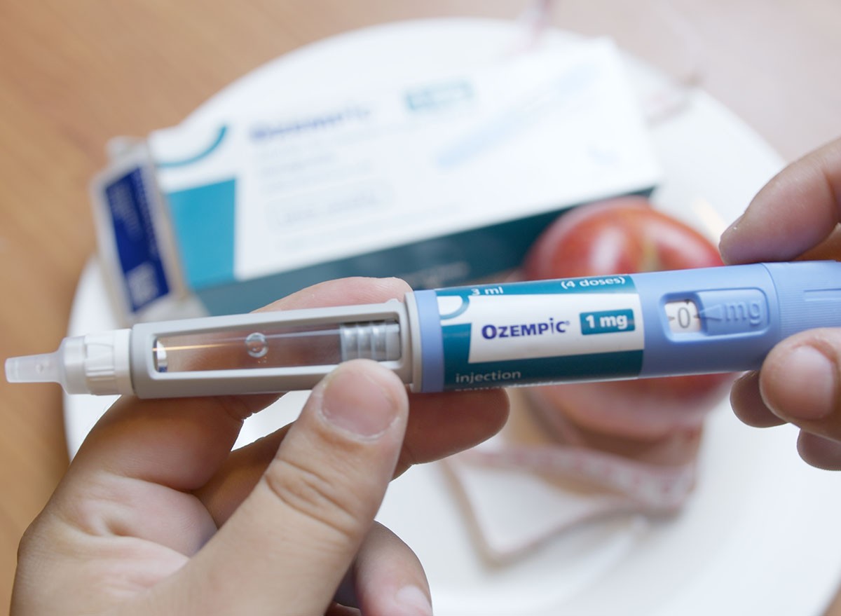 Qawra, Malta - 21.08.2024 - Semaglutide, Ozempic. Drug for diabetes and weight loss. Close up on injector pen in hands. High quality photo