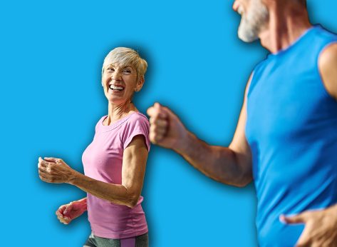 Portrait of a senior woman exercising in a gym, mature couple running using threadmill machine equipment, healthy lifestyle and cardio exercise at fitness club concepts, vitality and active senior