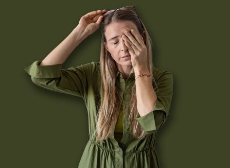 Sleepy woman suffering from chronic fatigue rubbing eyes on kitchen at home. Tired middle aged female feeling bad from lack of rest, headache, lack of energy after party, sleepless night.