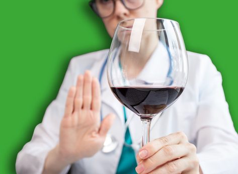 stop alcohol,doctor shows hand rejection of a alcoholic drinks