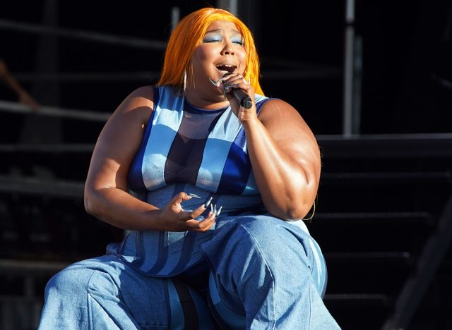 New Orleans, LA - April 28, 2023: Lizzo, an American rapper, singer and actress, headlines the "Festival Stage" at the 2023 New Orleans Jazz and Heritage Festival.