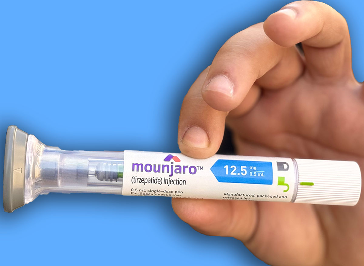 Basrah, Iraq - November 24, 2023: photo of Mounjaro Weight Loss Pen in hand