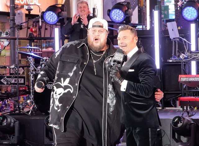 Jelly Roll and Ryan Seacrest in conversation on stage during 2024 New Year's celebration on Times Square in New York on December 31, 2023.