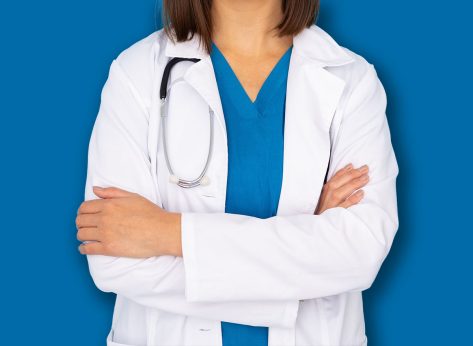 Portrait of a young female doctor in professional attire