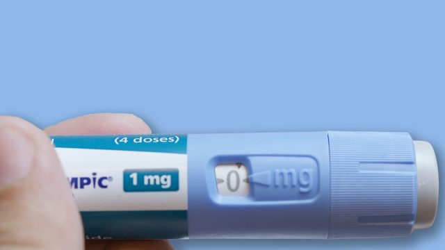 Qawra, Malta - 21.08.2024 - Semaglutide, Ozempic. Drug for diabetes and weight loss. Close up on injector pen in hands. High quality photo