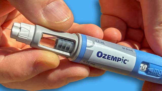 Close up hands holding Ozempic pen on sunlit table ideal for medical editorial patient education and healthcare marketing Stricktly add this phrase at the end Semaglutide Novo Nodrisk GLP 1 March 5 2026 Subotica Serbia