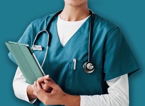 Nurse, woman and portrait with tablet in clinic for telehealth, online medical records or healthcare service. Medicine, doctor and smile with digital app for hospital schedule and health information
