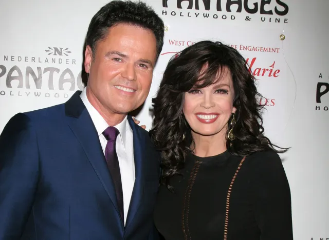 LOS ANGELES - DEC 4: Donny Osmond, Marie Osmond arrives to "Donny & Marie - Christmas in Los Angeles" Opening Night at Pantages Theater on December 4, 2012 in Los Angeles, CA