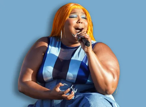 New Orleans, LA - April 28, 2023: Lizzo, an American rapper, singer and actress, headlines the "Festival Stage" at the 2023 New Orleans Jazz and Heritage Festival.